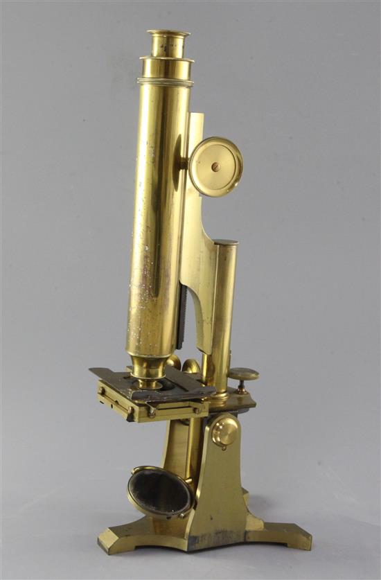 A late 19th century lacquered brass Smith and Beck monocular microscope, height 15in.